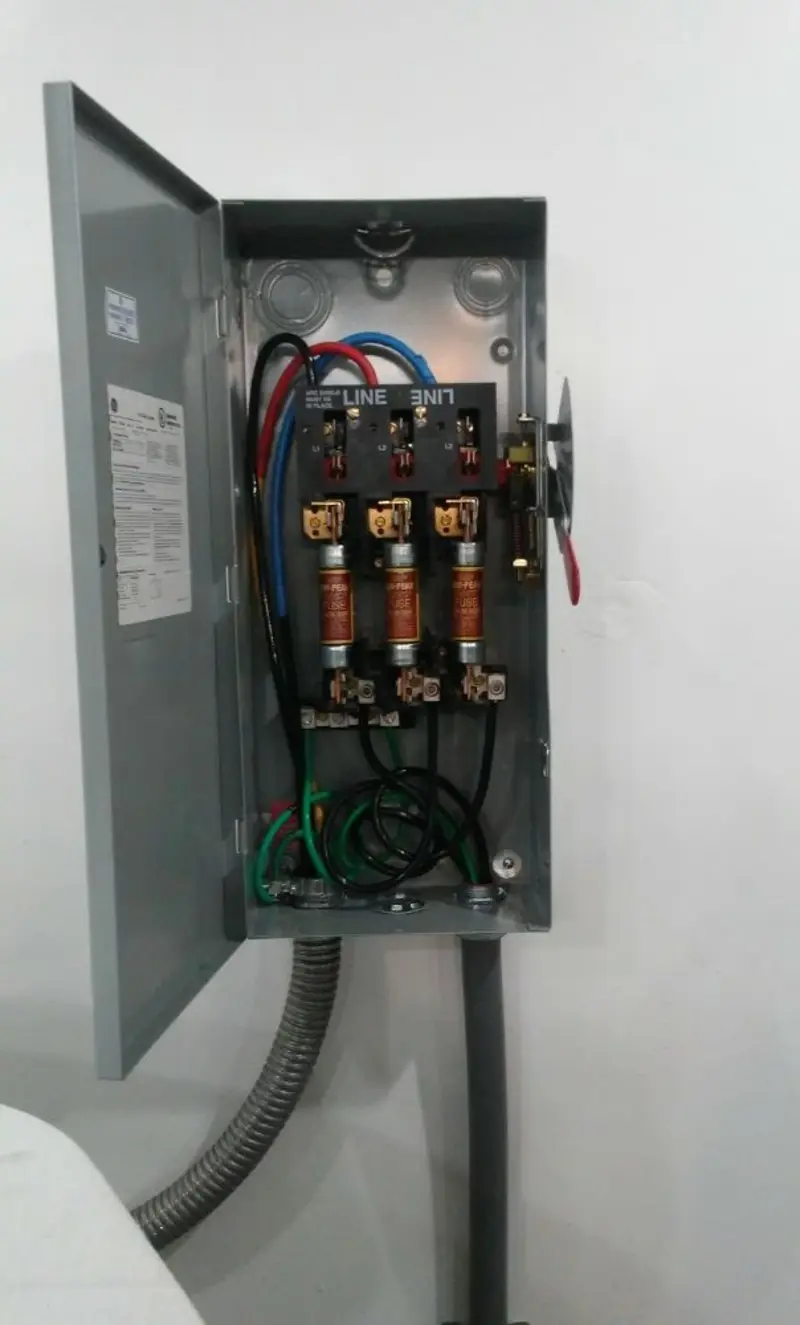 Three-phase disconnect switch installed for Smoke Detector Installation in St. Ann